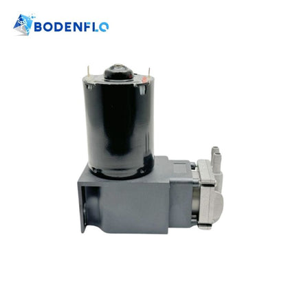 Side-angle view of the BD-079V-M small piston air suction pump, showcasing its robust build and efficient design.