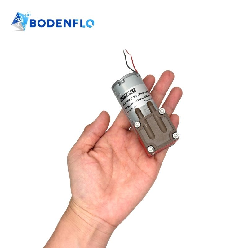 Side and angled view of the Miniature Diaphragm Pump, highlighting compact design and oil-free operation, suitable for pneumatic systems, BD-05T054.6L